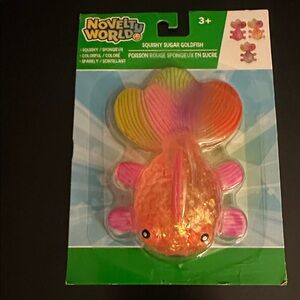 Viral Orange Glitter Squishy Sugar Goldfish Toy with pink accents